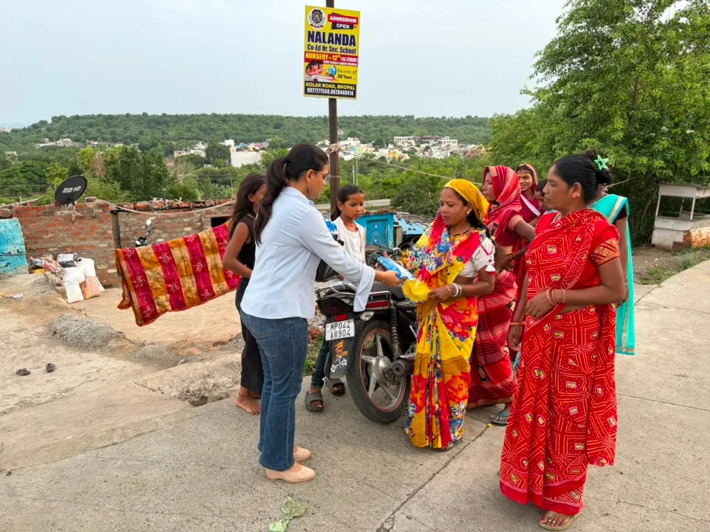 Women receiving welfare and hygiene support from SAANJ